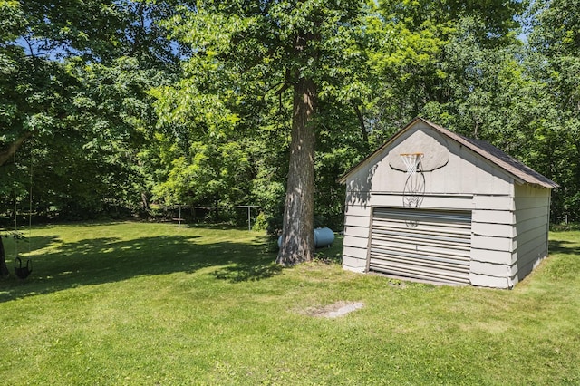 49227 US Highway 59, Dunn Twp, MN 56587 - view of grassy yard with a detached garage and an outdoor structure