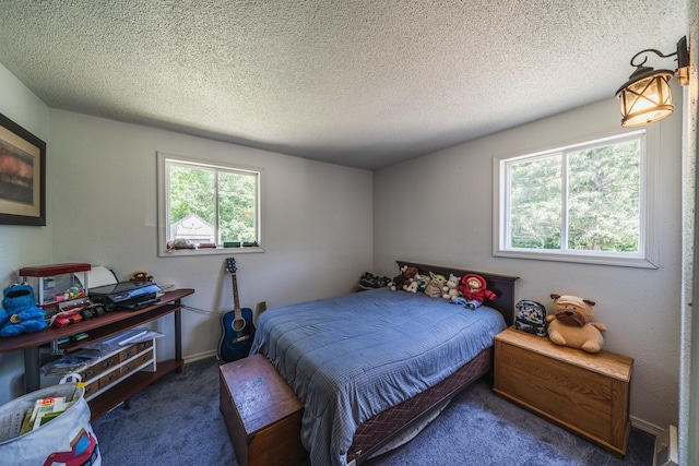 49227 US Highway 59, Dunn Twp, MN 56587 - carpeted bedroom with a textured ceiling