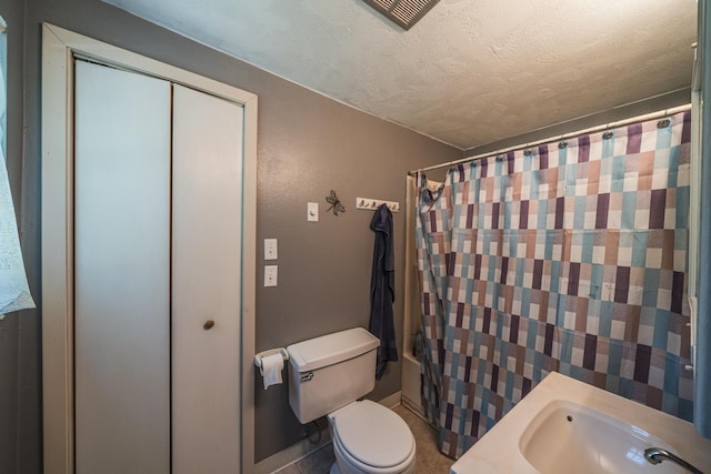 49227 US Highway 59, Dunn Twp, MN 56587 - bathroom featuring toilet and a textured ceiling