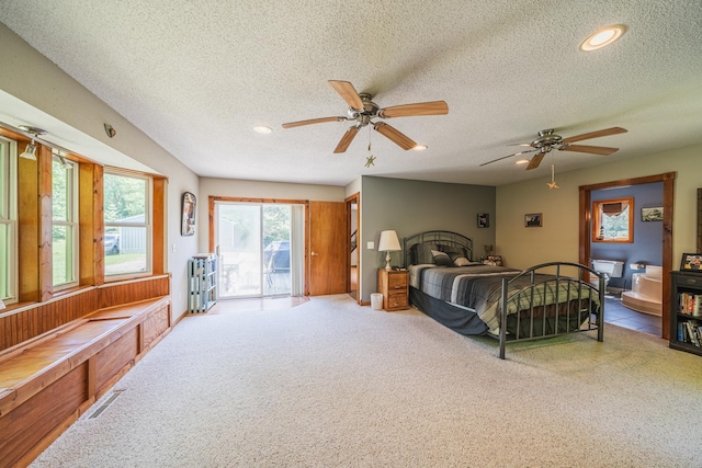 49227 US Highway 59, Dunn Twp, MN 56587 - bedroom with access to exterior, a textured ceiling, carpet flooring, recessed lighting, and ceiling fan