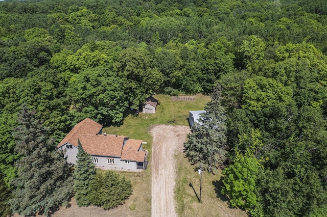 49227 US Highway 59, Dunn Twp, MN 56587 - aerial view of property and surrounding area featuring a heavily wooded area