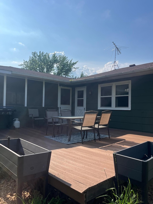 1307 20th St W, Hastings, MN 55033 - wooden terrace with outdoor dining area