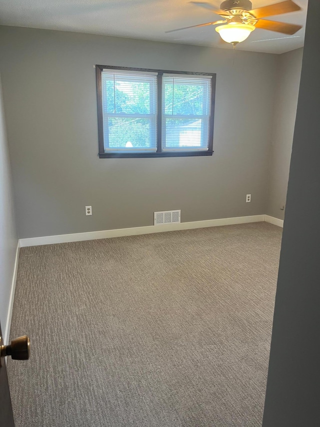 1307 20th St W, Hastings, MN 55033 - carpeted spare room featuring a ceiling fan and baseboards