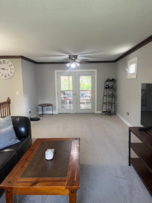 1307 20th St W, Hastings, MN 55033 - living room with french doors, carpet floors, crown molding, a ceiling fan, and plenty of natural light