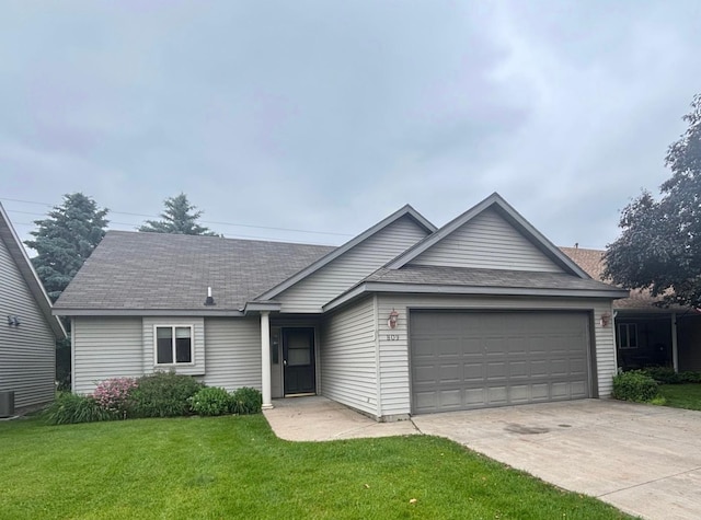 809 Aspen Cir, Waite Park, MN 56387 - ranch-style house with an attached garage, a front yard, concrete driveway, and a shingled roof