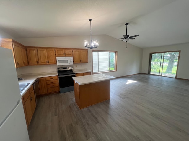 809 Aspen Cir, Waite Park, MN 56387 - kitchen with stainless steel appliances, a center island, light countertops, wood finished floors, and lofted ceiling
