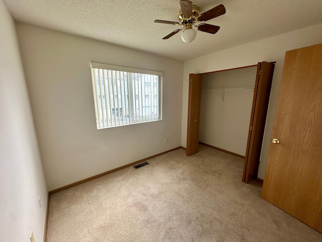 9100 Terra Verde Trl, Eden Prairie, MN 55347 - unfurnished bedroom featuring carpet floors, a closet, and a ceiling fan