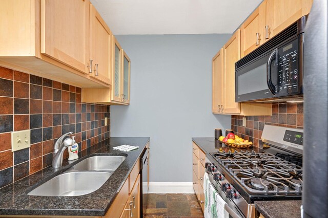 1820 1st Ave S Unit 207, Minneapolis, MN 55403 - kitchen featuring black appliances, light brown cabinetry, backsplash, dark stone countertops, and dark stone finish flooring