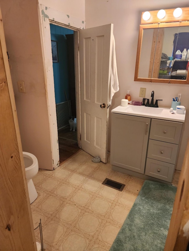 105 Main St, Brownsdale, MN 55918 - bathroom featuring vanity and tile patterned floors