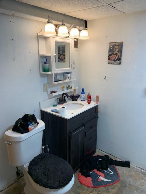 105 Main St, Brownsdale, MN 55918 - bathroom featuring vanity and unfinished concrete floors