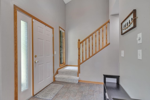 504 3rd St N, Sartell, MN 56377 - foyer with stairs and stone finish flooring