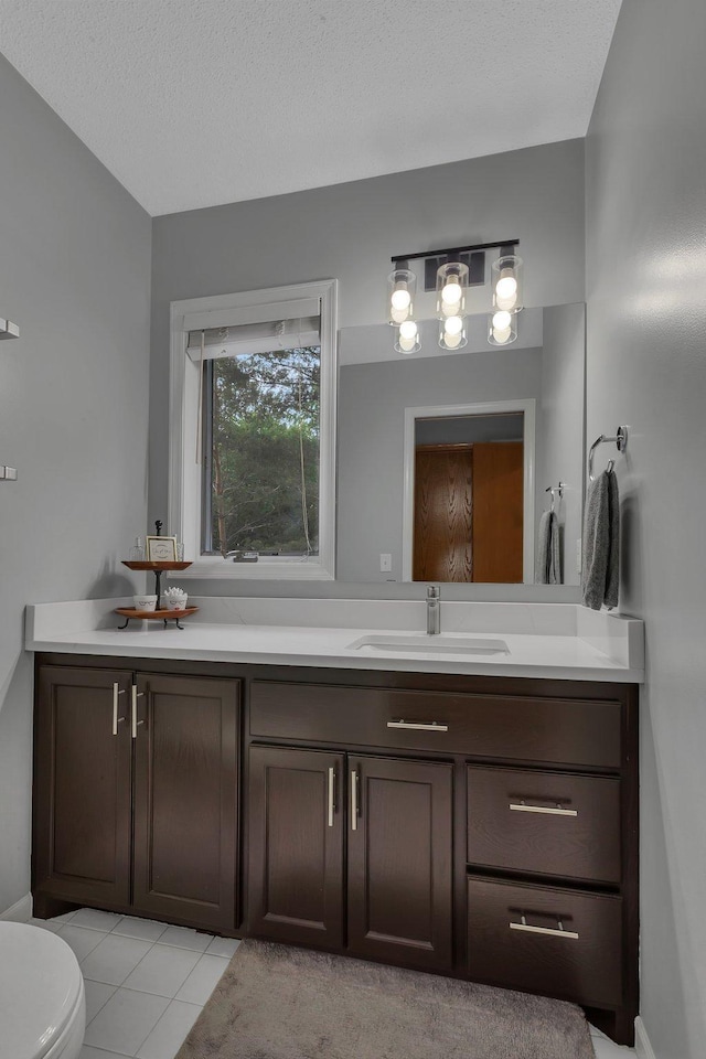 504 3rd St N, Sartell, MN 56377 - bathroom featuring vanity and tile patterned floors