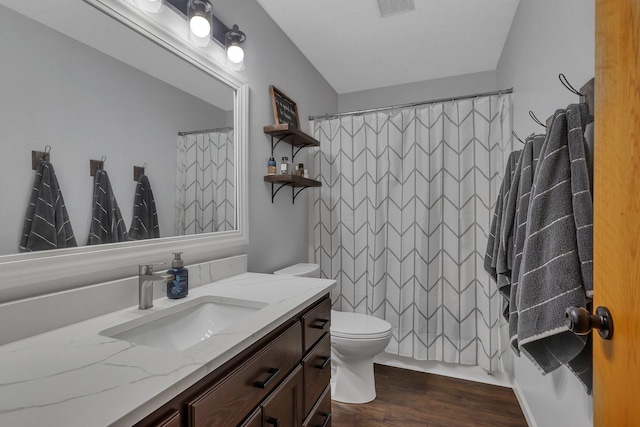 504 3rd St N, Sartell, MN 56377 - full bath featuring vanity, wood finished floors, and curtained shower