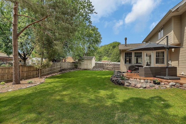 504 3rd St N, Sartell, MN 56377 - fenced backyard featuring a storage shed, an outdoor living space, and a patio area