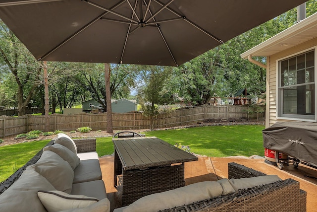 504 3rd St N, Sartell, MN 56377 - fenced backyard featuring outdoor lounge area, a patio area, and a grill