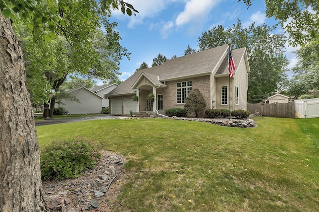 504 3rd St N, Sartell, MN 56377 - ranch-style home featuring an attached garage, driveway, and a shingled roof