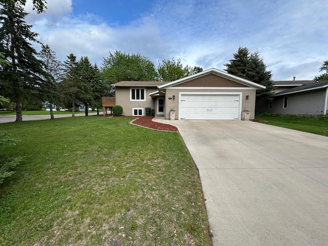 605 Park Island Dr SW, Hutchinson, MN 55350 - view of front of property with concrete driveway, an attached garage, and a front yard
