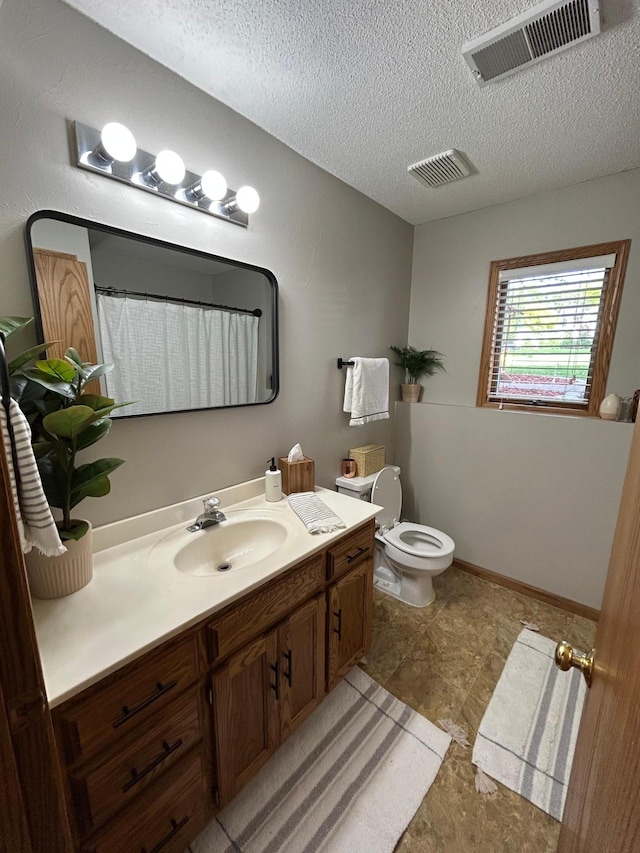 605 Park Island Dr SW, Hutchinson, MN 55350 - bathroom featuring vanity and a textured ceiling