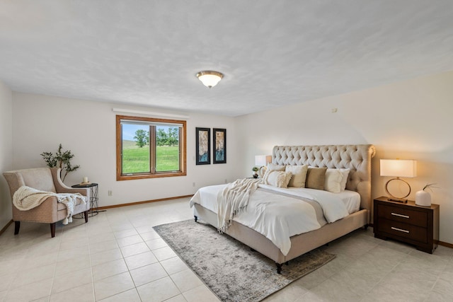 19800 Stephan Dr, Minnewaska Twp, MN 56381 - bedroom with baseboards and light tile patterned floors