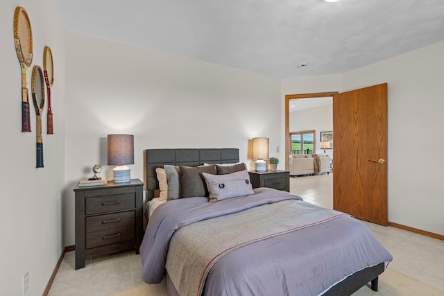 19800 Stephan Dr, Minnewaska Twp, MN 56381 - bedroom with light tile patterned floors and baseboards