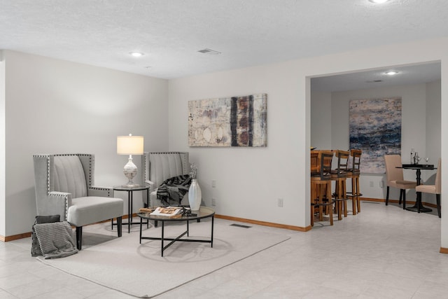 19800 Stephan Dr, Minnewaska Twp, MN 56381 - sitting room with a textured ceiling and recessed lighting