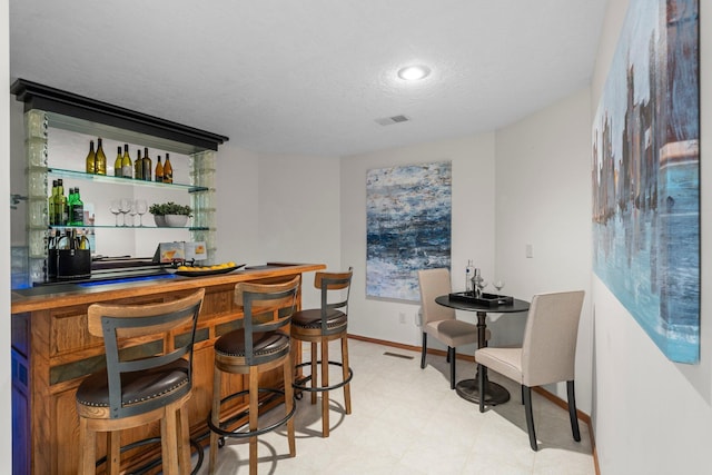 19800 Stephan Dr, Minnewaska Twp, MN 56381 - indoor bar with a textured ceiling and baseboards
