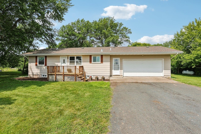 559 State Highway 35, East Farmington, WI 54020 - ranch-style home with driveway, a front lawn, and a garage