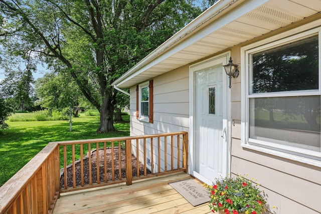 559 State Highway 35, East Farmington, WI 54020 - wooden terrace featuring a lawn