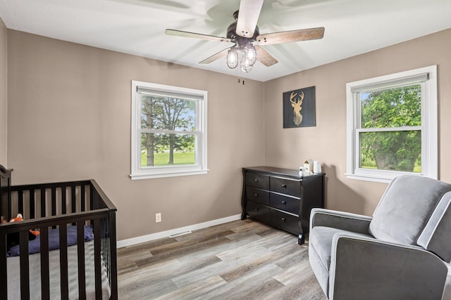559 State Highway 35, East Farmington, WI 54020 - bedroom with wood finished floors and ceiling fan