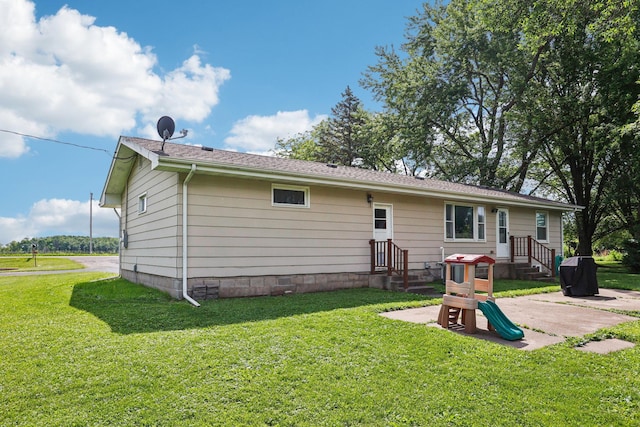 559 State Highway 35, East Farmington, WI 54020 - rear view of property featuring a patio and a yard
