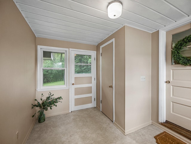 8545 70th St NW, Annandale, MN 55302 - doorway featuring baseboards and concrete floors