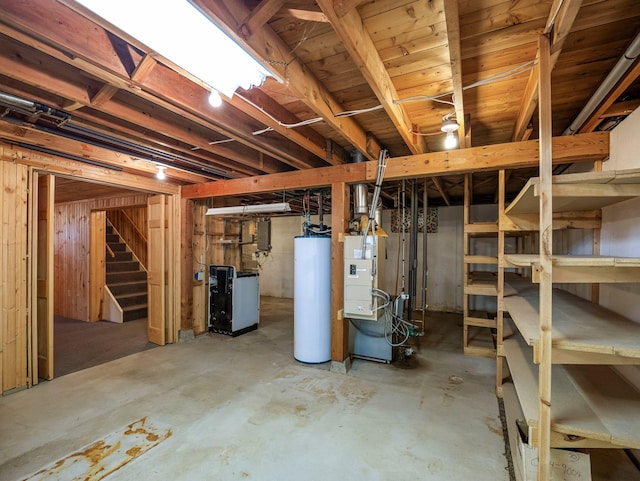 8545 70th St NW, Annandale, MN 55302 - unfinished below grade area featuring water heater, stairway, and a heating unit