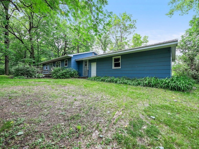 8545 70th St NW, Annandale, MN 55302 - back of property featuring a yard