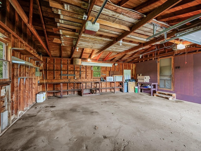 8545 70th St NW, Annandale, MN 55302 - garage featuring a garage door opener