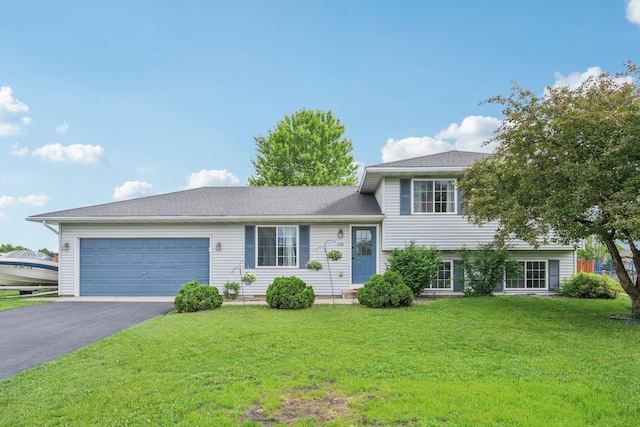 608 Frontier Cir, Belle Plaine, MN 56011 - split level home with driveway, a garage, a front yard, and roof with shingles