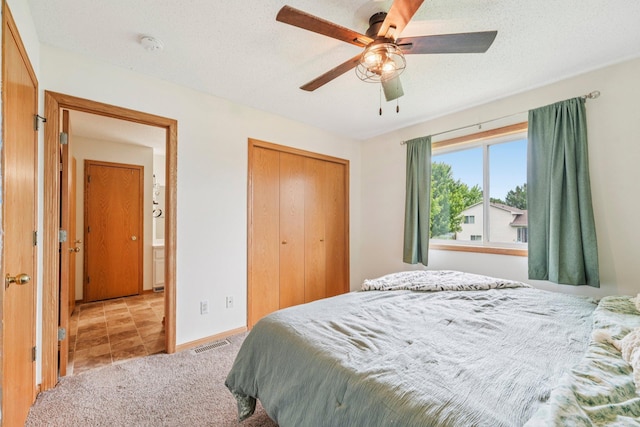608 Frontier Cir, Belle Plaine, MN 56011 - bedroom with a closet, a ceiling fan, and carpet flooring