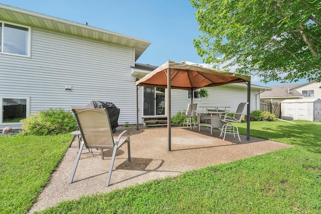 608 Frontier Cir, Belle Plaine, MN 56011 - view of patio / terrace featuring a storage unit and area for grilling
