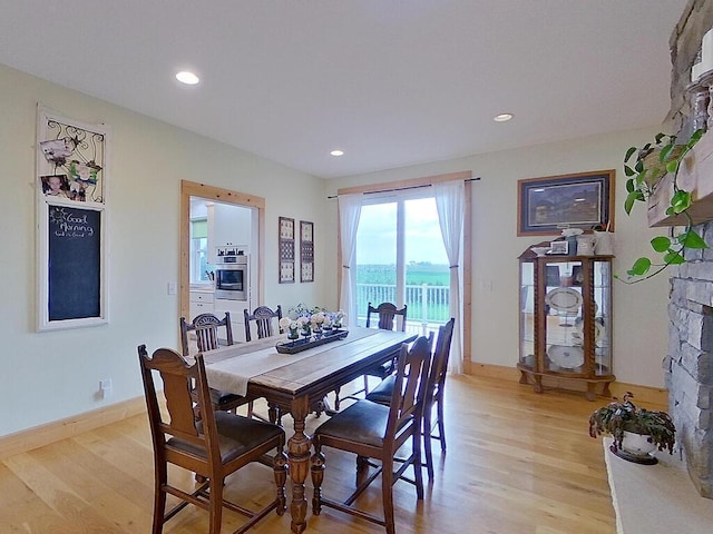 6828 Rhoades Ave SW, Cokato, MN 55321 - dining room featuring light wood-style flooring and recessed lighting