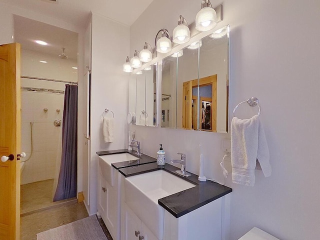 6828 Rhoades Ave SW, Cokato, MN 55321 - bathroom featuring tiled shower and double vanity