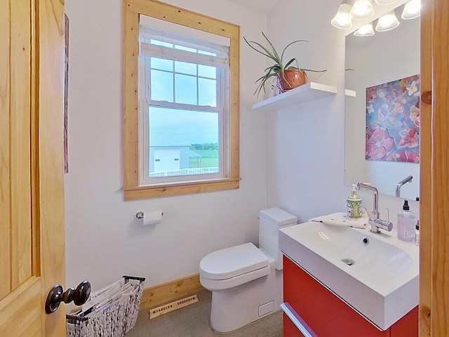 6828 Rhoades Ave SW, Cokato, MN 55321 - half bathroom featuring vanity and toilet