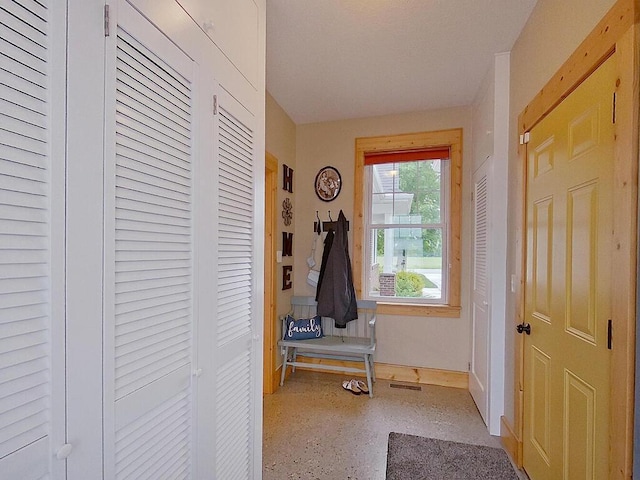 6828 Rhoades Ave SW, Cokato, MN 55321 - doorway featuring baseboards and speckle patterned floor