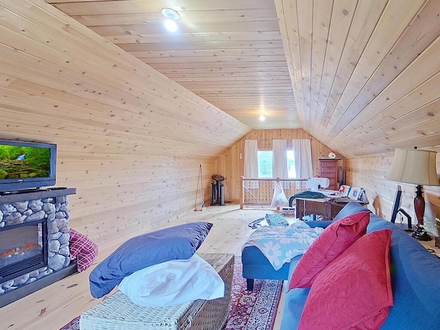 6828 Rhoades Ave SW, Cokato, MN 55321 - bedroom featuring wooden walls, vaulted ceiling, wood finished floors, wood ceiling, and a fireplace