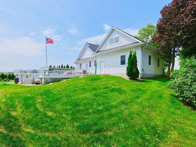 6828 Rhoades Ave SW, Cokato, MN 55321 - rear view of house featuring a yard and a wooden deck