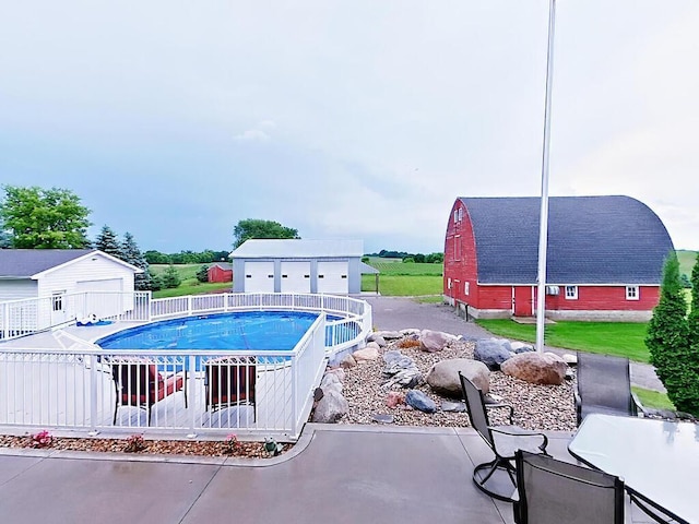 6828 Rhoades Ave SW, Cokato, MN 55321 - view of swimming pool with an outdoor structure