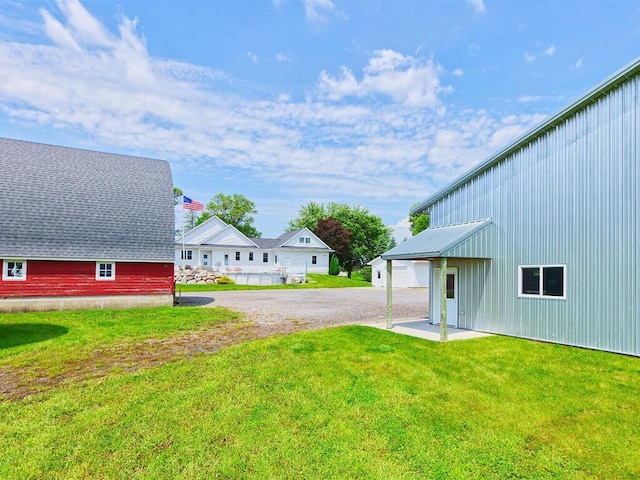 6828 Rhoades Ave SW, Cokato, MN 55321 - view of green lawn with driveway