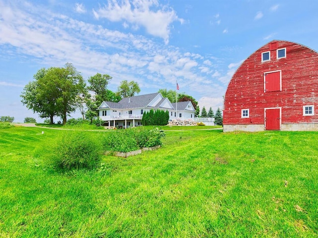6828 Rhoades Ave SW, Cokato, MN 55321 - view of grassy yard with a barn and an outdoor structure