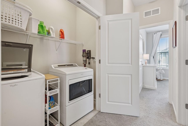 8094 Arrowwood Ln N, Maple Grove, MN 55369 - laundry room with separate washer and dryer and light colored carpet
