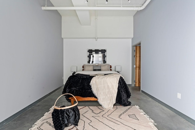 2929 Chicago Ave Unit 1208, Minneapolis, MN 55407 - bedroom with concrete flooring and a high ceiling