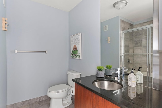 2929 Chicago Ave Unit 1208, Minneapolis, MN 55407 - bathroom with vanity, a shower stall, and tile patterned flooring