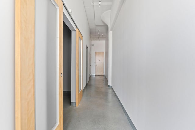 2929 Chicago Ave Unit 1208, Minneapolis, MN 55407 - corridor with finished concrete floors and attic access